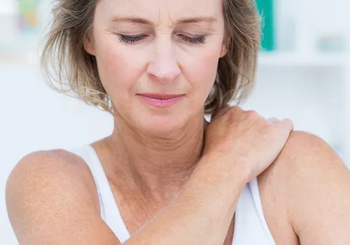 Chiropractic Jacksonville FL Woman Shoulder Pain